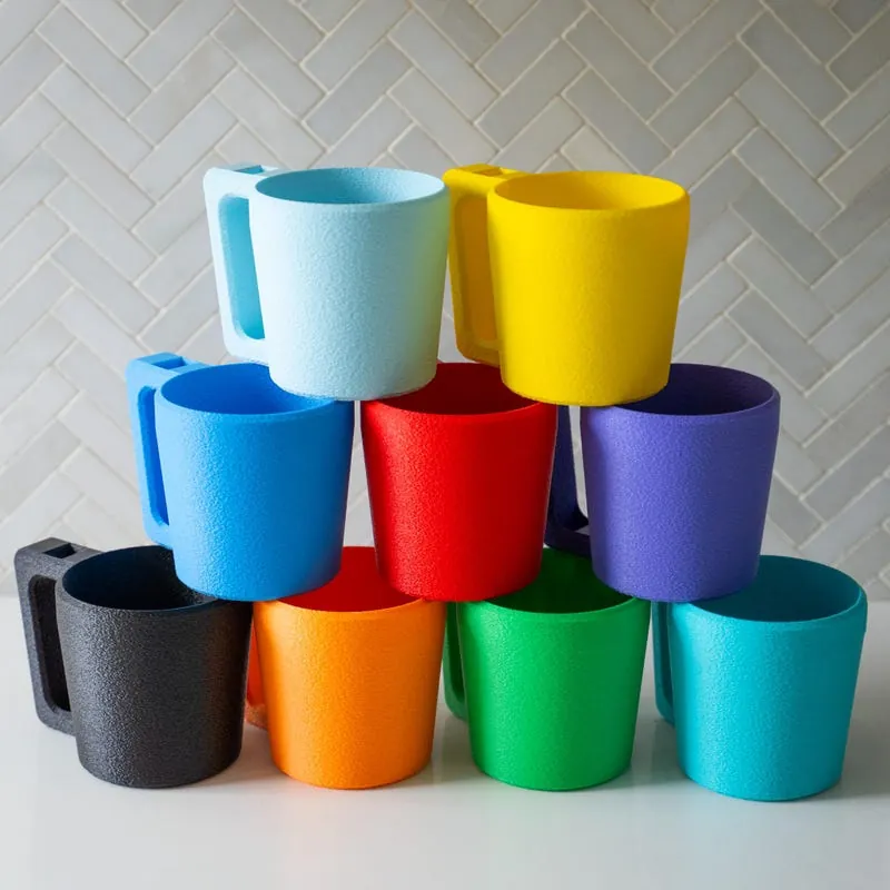Stack of colourful ice cream pint holders